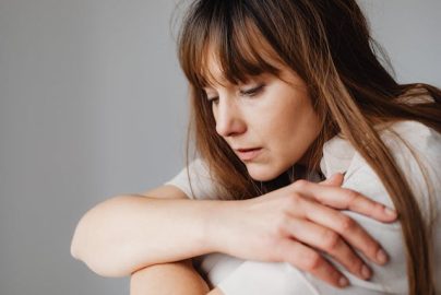 Scared woman overwhelmed by fear